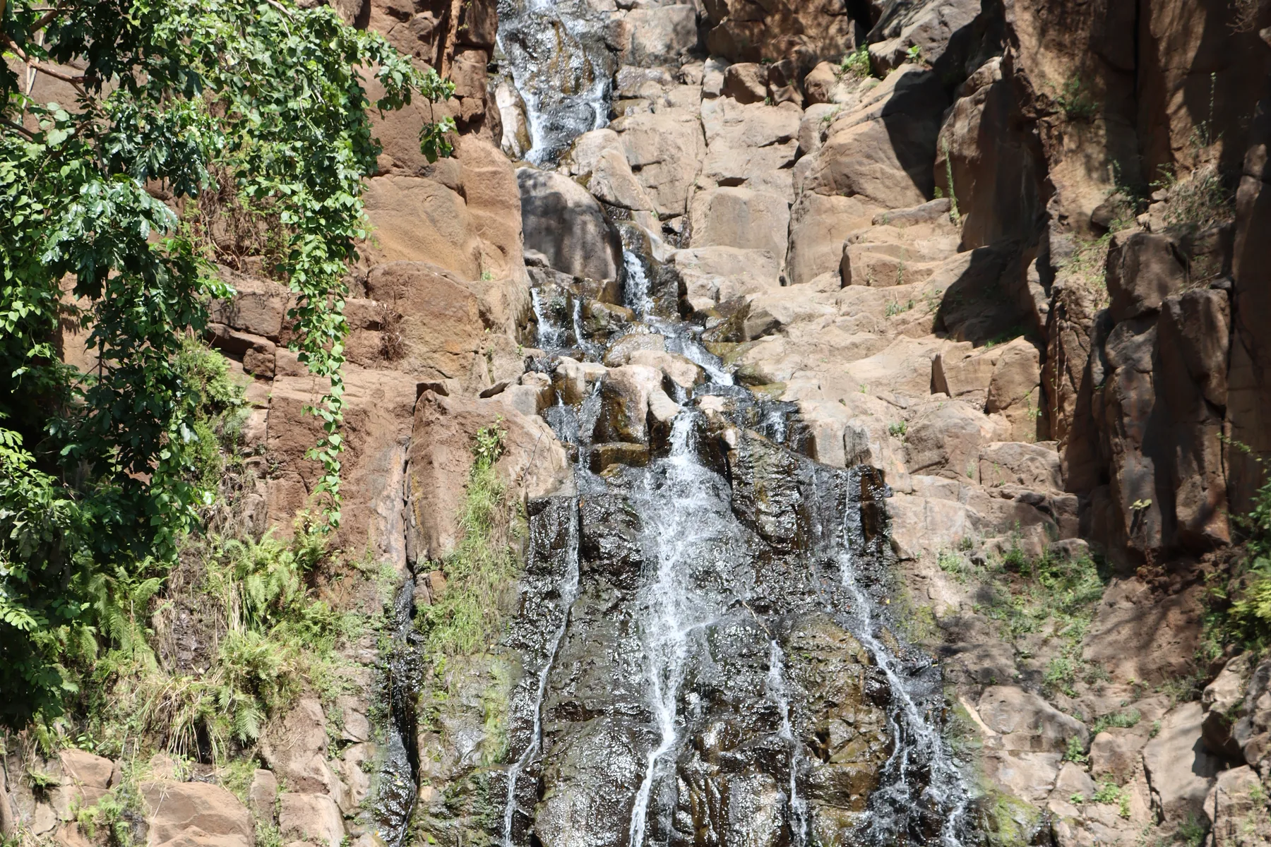Waterfall experience in the green Arusha region
